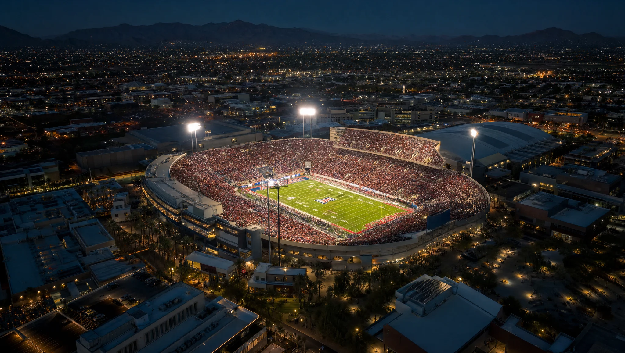 Tucson stadium glowing at night